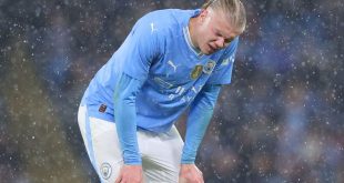 Erling Haaland of Manchester City reacts after a heavy challenge during the Emirates FA Cup Quarter Final match between Manchester City and Newcastle United at Etihad Stadium on March 16, 2024 in Manchester, England.