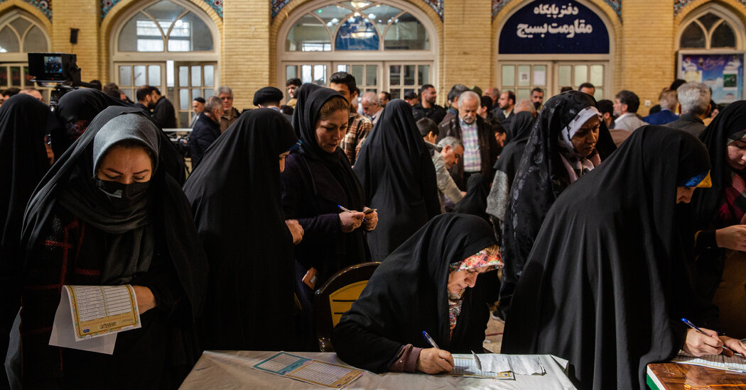 Many Iranians Boycott Vote, Despite Officials’ Pleas and Roses at Polls