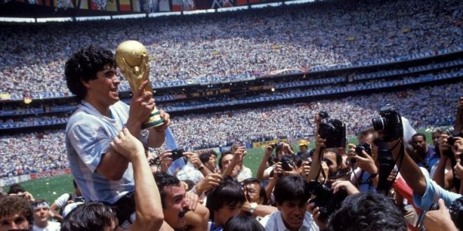 Diego Maradona lifts the World Cup trophy at Mexico