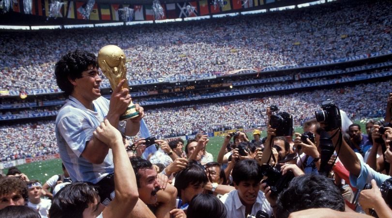 Diego Maradona lifts the World Cup trophy at Mexico