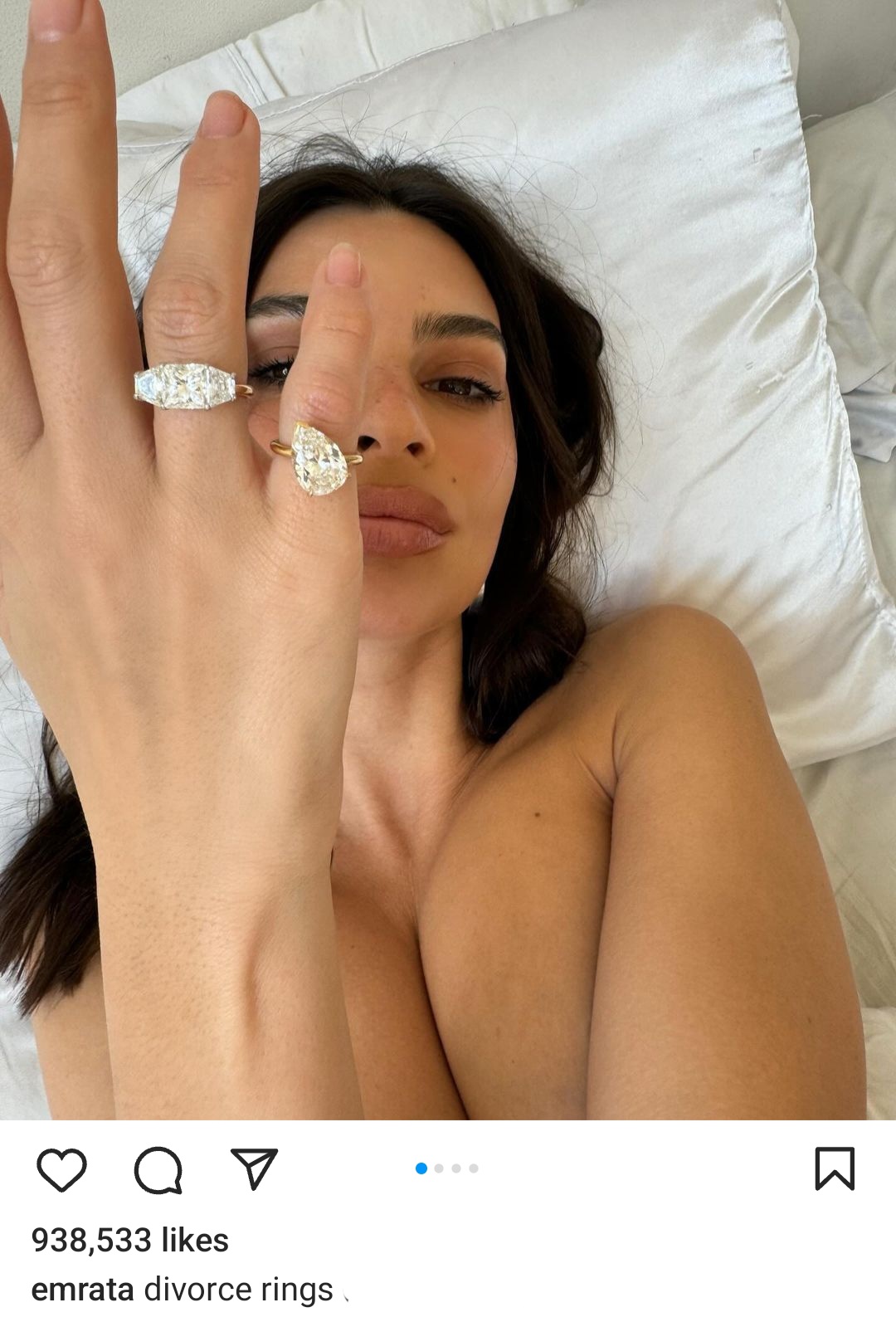 Model Emily Ratajkowski shows off her divorce rings which was created by splitting her engagement rings into two following split from ex-husband