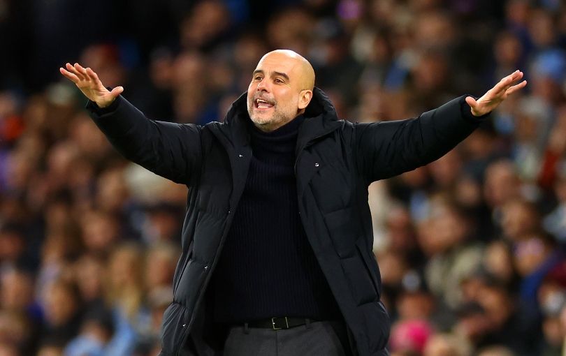 Pep Guardiola gesturing on the touchline against Brentford