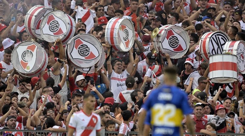 River Plate fans cheer on their team and bang drums during a Superclásico against Boca Juniors in February 2024.