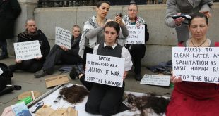 Women shave their heads in Gaza protest outside UK parliament