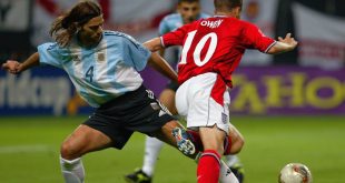 Michael Owen (No.10) of England is tackled in the penalty area by Mauricio Pochettino (No.4) of Argentina during the England v Argentina, Group F, World Cup Group Stage match played at the Sapporo Dome in Sapporo, Japan on June 7, 2002. England won the match 1-0.