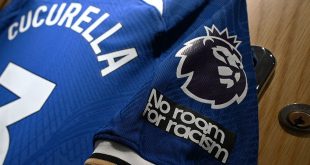 A detailed view of the No room for racism logo is seen on the shirt of Marc Cucurella inside the Chelsea dressing room prior to the Premier League match between Chelsea FC and Liverpool FC at Stamford Bridge on August 13, 2023 in London, England.