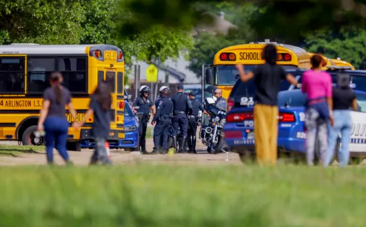Student killed and another arrested in Texas high school shooting