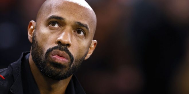 Thierry Henry looks on