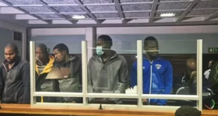 Bail denied for eight Nigerian nationals accused of assaulting cops and damaging police station in South Africa