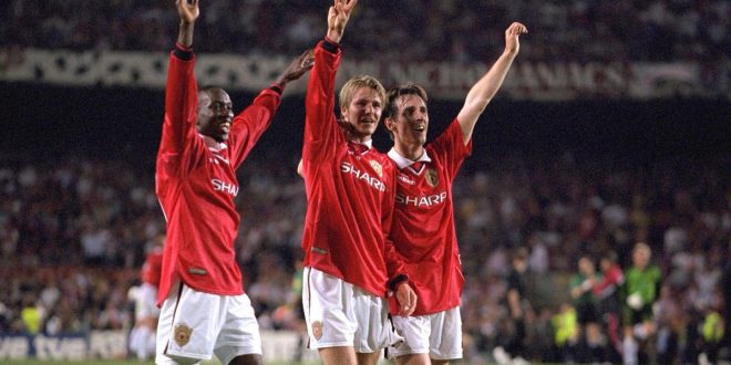 Dwight Yorke, David Beckham and Gary Neville celebrate – stars of new Amazon Prime doc 99 – after the UEFA Champions League Final between Bayern Munich v Manchester United at the Nou camp Stadium on 26 May, 1999