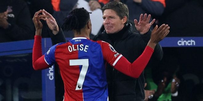 Michael Olise celebrates with Crystal Palace manager Oliver Glasner after scoring his side