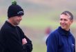 Alan Hansen and Gary Lineker share a joke at a golf tournament in October 2001.