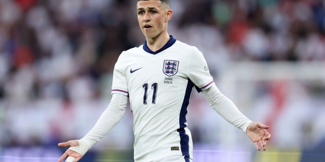 Phil Foden of England reacts during the UEFA EURO 2024 group stage match between Serbia and England at Arena AufSchalke on June 16, 2024 in Gelsenkirchen, Germany.
