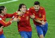 Sergio Ramos and Gerard Pique celebrate with Carles Puyol after his goal for Spain against Germany at the 2010 World Cup.