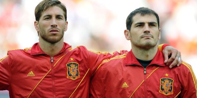 Spain pair Sergio Ramos and Iker Casillas look on during the Spanish national anthem ahead of a game against Italy at Euro 2012.