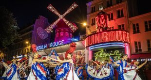 The Windmills Are Back Up on the Moulin Rouge