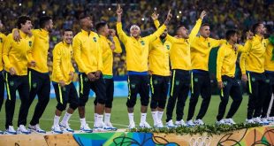 Brazil players celebrate with the gold medals after winning the men