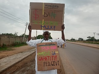 Elderly man hits the streets of Kano to begin protest