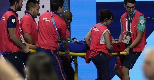 Olympic swimmer collapses in front of horrified�spectators in Paris