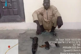 Boko Haram Terrorist surrenders, hands over AK 47 Rifle, ammunition to Troops