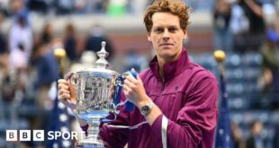 Jannik Sinner with the US Open trophy