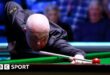 Four-time world snooker champion John Higgins in action