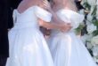 Rebel Wilson and her wife Ramona Agruma wear near-identical wedding dresses as they wed in Sardinia