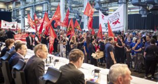 VW workers stage protest as managers and unions hold talks