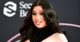 Cardi B vows legal action against troll who called child protective services on her