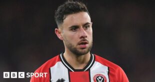 George Baldock playing for Sheffield United in the Premier League