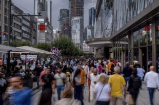 German consumer climate reaches 18-month high as income optimism rises