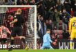 Illan Meslier looks at the ground after Sunderland's 97th-minute equaliser