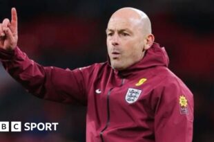 Lee Carsley scratches his head at an England training session