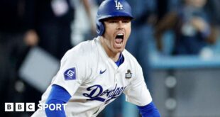 Los Angeles Dodgers first baseman Freddie Freeman celebrates after hitting a walk-off grand slam to win game one of the World Series