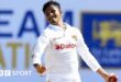 Praveen Jayawickrama prepares to bowl the ball