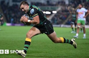 Ollie Sleightholme runs in a try for Northampton Saints