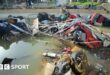 Wreckage of cars remain submerged in the water after flash floods in Valencia.