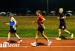 Competitors run through the night in the Sri Chinmoy 24hr Track Race in Battersea Park