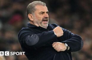 Tottenham manager Ange Postecoglou urges on his players during the Carabao Cup win against Manchester City