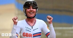 Katie Archibald celebrates after winning a race at the 2023 European Championships