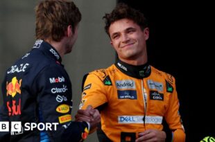 Lando Norris and Max Verstappen clasp hands after qualifying for the United States Grand Prix