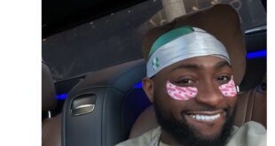 Davido wears Nigerian flag on his head to interview after receiving heat for speaking about the poor state of Nigeria