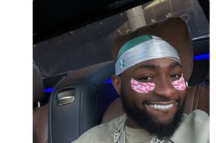 Davido wears Nigerian flag on his head to interview after receiving heat for speaking about the poor state of Nigeria