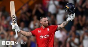 England opener Phil Salt raises his bat and helmet after hitting a century