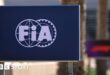 The FIA logo on a board at the side of the track during testing in Bahrain