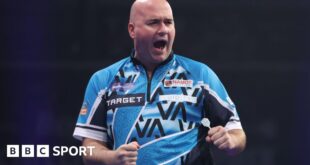 Rob Cross celebrates his win over Peter Wright