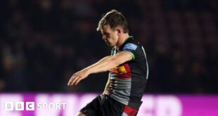 Harlequins fly-half Jamie Benson kicks the ball off a tee with his head down