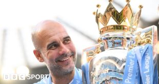 Pep Guardiola with the Premier League trophy