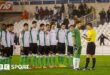 Racing Santander players speak to the referee