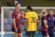 Kristie Mewis and Sam Kerr following a match between the USA and Australia in 2021